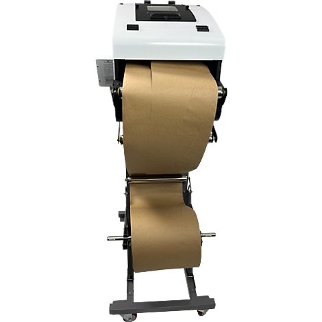 Papierverpakkingsmachine met papieren rol. Gemonteerd op rolwagen.