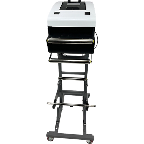 Industrielle Folienschweissmaschine. Weiss-schwarzes Gerät auf grauem Gestell mit Rollen.