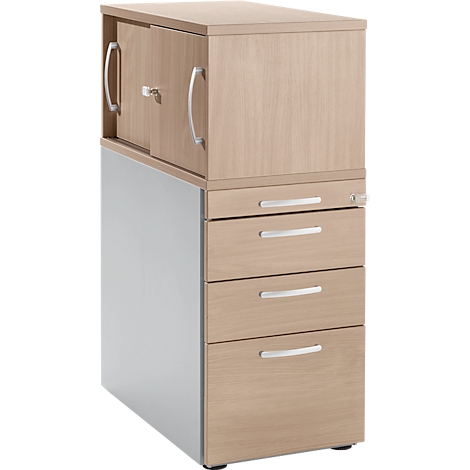 Combination of light wood cabinet with drawers and doors.