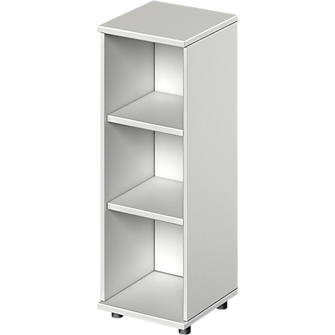 White shelf with three compartments. The shelf stands on small feet.