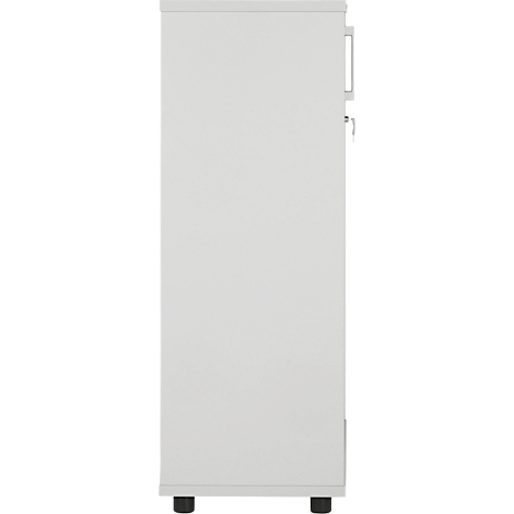 A white cabinet, side view. It has a handle, a lock and stands on two feet.