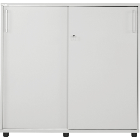 A white cabinet with sliding doors. Handles and a keyhole are visible.