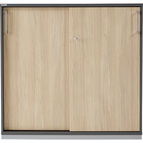 Light wood cabinet with sliding doors, dark frame and silver handles.