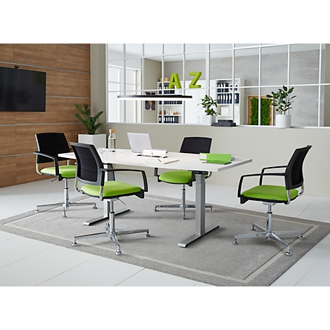 Conference room with table, chairs and laptop. Green chairs, white table, carpet and glass wall. Letters AZ on the wall.