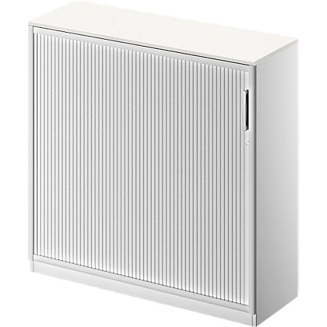 White cabinet with vertically ribbed front, handle strip on the right.