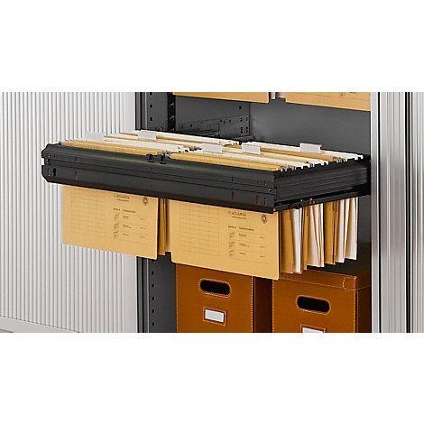 Hanging file with documents in a filing cabinet. Brown boxes below.