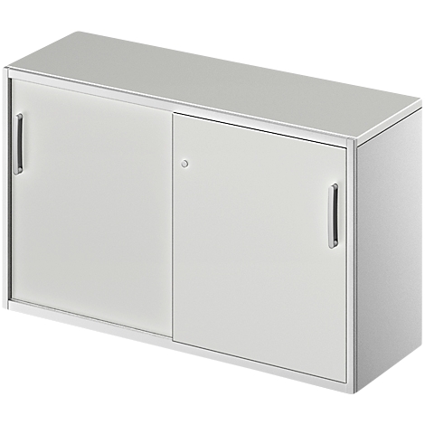 A grey cabinet with a sliding door. The cabinet has two handles and a keyhole. The left compartment is open.