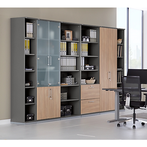 Large grey office cabinet with wood and glass doors. Filled with folders, files, and decor.