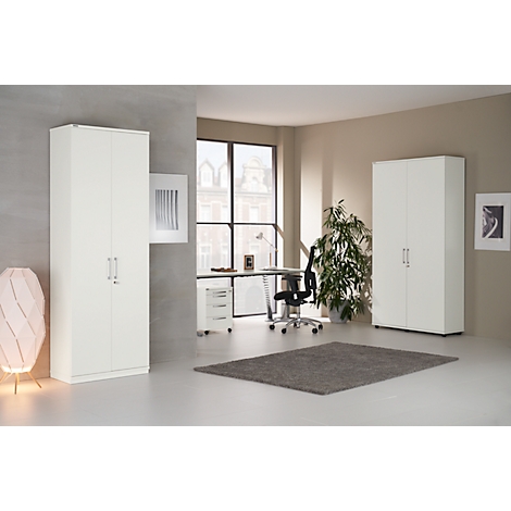 Office with two white cabinets, desk, chair, plants and rug.