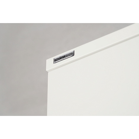 Detail shot of a white piece of furniture with "SCHÄFER SHOP" logo.