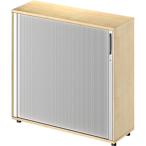 Lichtbruine kast met lamellendeur en handvat.