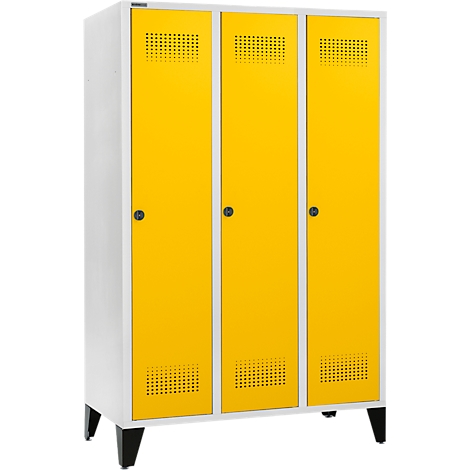 Armoire triple avec portes jaunes et corps blanc, posée sur des pieds noirs.