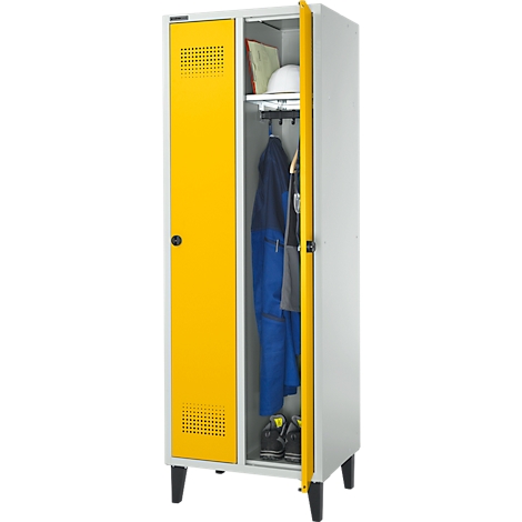 Yellow-grey locker, one door open, work clothes inside. Black shoes at the bottom.