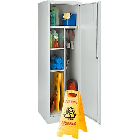 Open cabinet with cleaning supplies and a warning sign about slippery floors.