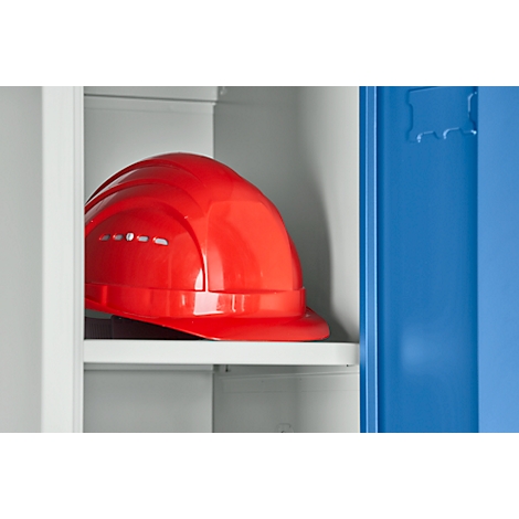 Red construction helmet inside a cabinet. The helmet rests on a shelf. The cabinet is blue and gray.