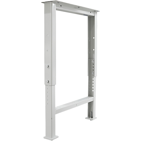 White, rectangular metal frame for a table. The construction consists of vertical and horizontal struts with holes and screws.