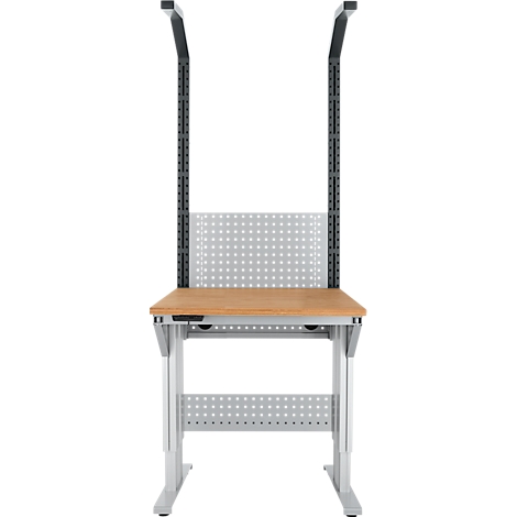 Een metalen bureau, met een houten blad en geperforeerde achterwand en beugel.