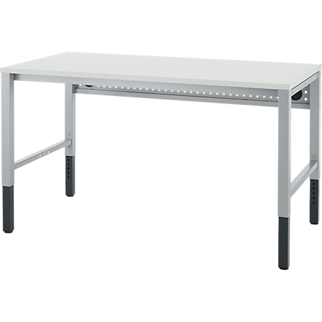 Een witte bureau met metalen poten. De poten zijn grijs met zwarte, in hoogte verstelbare delen.