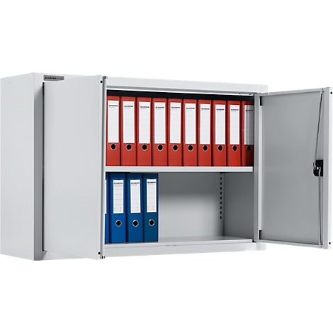 Grauer Stahlschrank, offen, mit roten und blauen Aktenordnern.