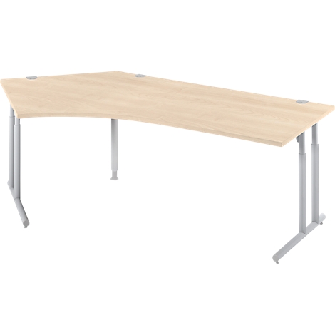 Light brown corner desk with silver, height-adjustable legs. The desk is set against a white background.