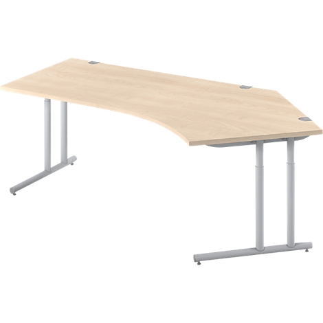 An ergonomic desk with a light brown wooden top and silver legs, adjustable in height.