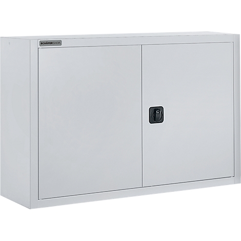 Armario de pared rectangular blanco con dos puertas y un tirador negro. En la parte superior izquierda hay un letrero con "SCHÄFERSHOP".