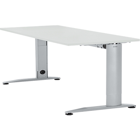 Un bureau blanc réglable en hauteur avec deux pieds argentés sur fond blanc.