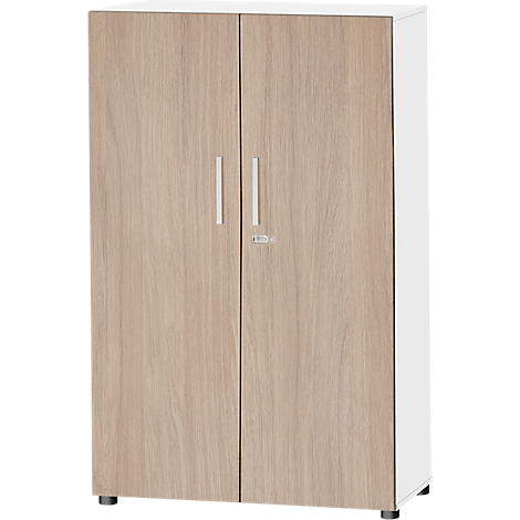 A cabinet with two doors, wood grain, silver handles, and a white side panel. Small black feet underneath.