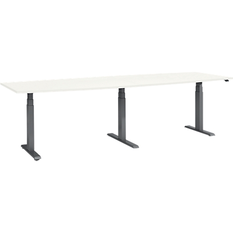 A white rectangular desk with height-adjustable gray metal legs.