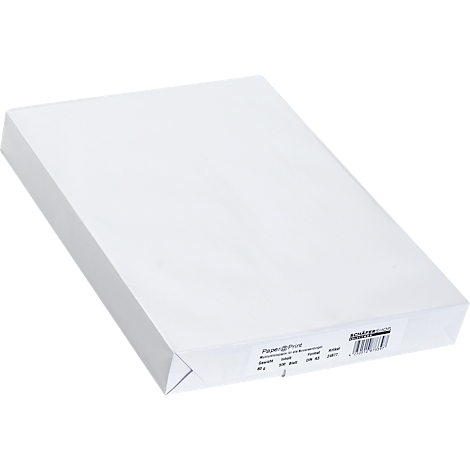 A stack of white paper in a package. There is a label with information and a barcode on the packaging.