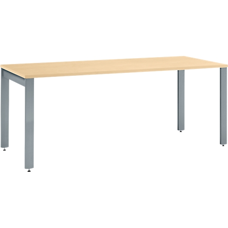 A rectangular, light-colored table with metallic legs. The tabletop is light brown, the legs are gray.