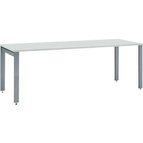 White office desk with gray metallic legs. Rectangular tabletop, standing on four legs.