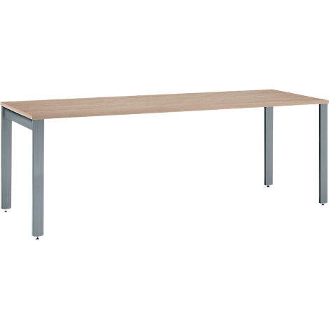 A rectangular, light-colored wooden table with gray metal legs. It stands against a white background.