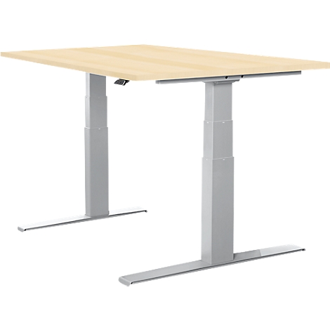 A height-adjustable desk with a light brown tabletop and silver legs.