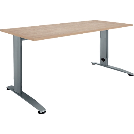 Light brown desk with metallic legs, front view.