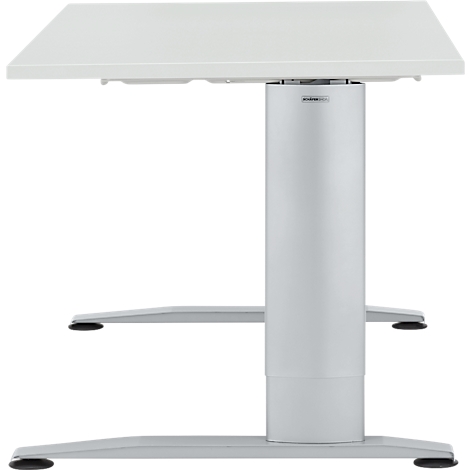 White height-adjustable desk. Tabletop, column and frame are light gray, the feet have black pads.