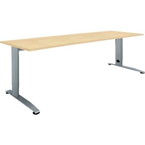 Beige desk with silver legs. Height adjustable, simple design.