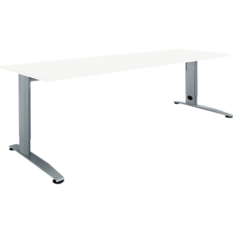 A white rectangular desk with silver, height-adjustable legs. Both table legs are attached to the corners.