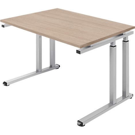 Light brown desk with silver legs, against a white background.