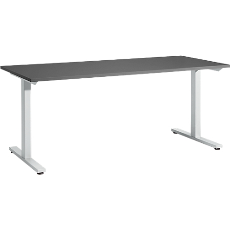 Grey desk with white legs, photographed in perspective from the front.