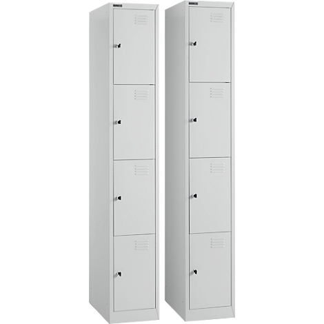 Deux armoires grises, chacune avec quatre portes, de petites poignées et des fentes de ventilation. Disposées de manière décentralisée.