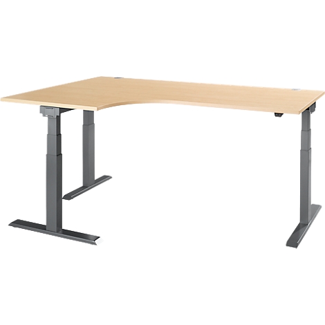 A beige corner desk with gray, height-adjustable legs. The tabletop has a wood grain.
