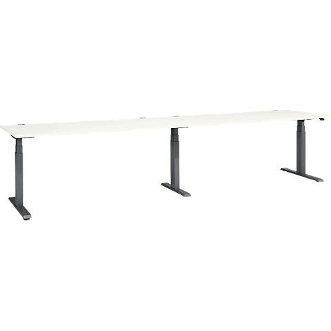White desk with gray, height-adjustable legs. The table top is rectangular.