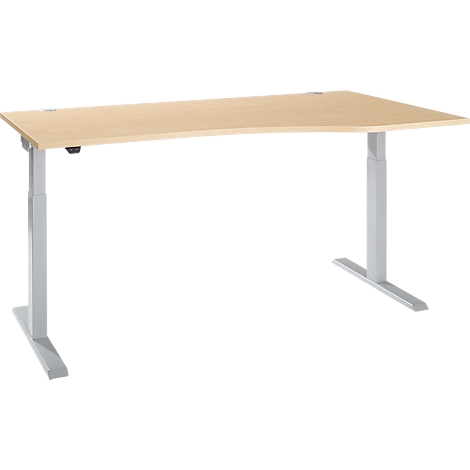 Light-colored ergonomic corner desk with grey-silver, height-adjustable legs. The tabletop is light brown.