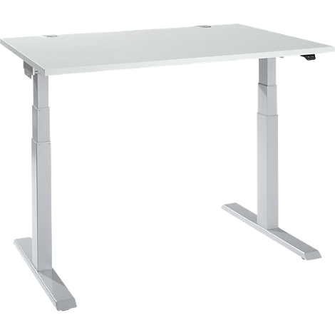 An adjustable height desk with white table top and light grey legs. The desk is isolated on a white background.