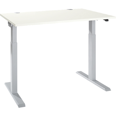 A white, height-adjustable desk with a silver frame. There is a small hole in the tabletop on the left.