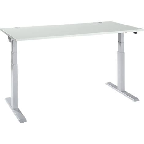 A height-adjustable white desk with silver legs. The tabletop is rectangular, the legs are sturdy and modern.