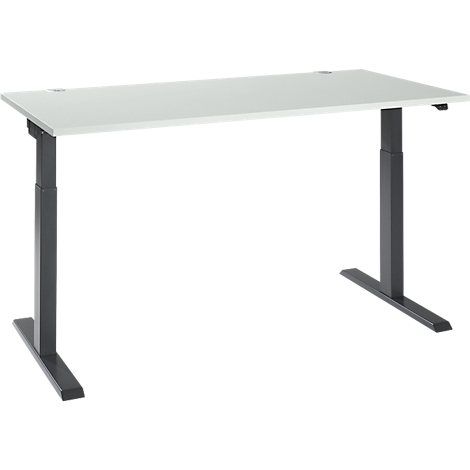 A white, height-adjustable desk with black legs. The tabletop is rectangular and has rounded corners.