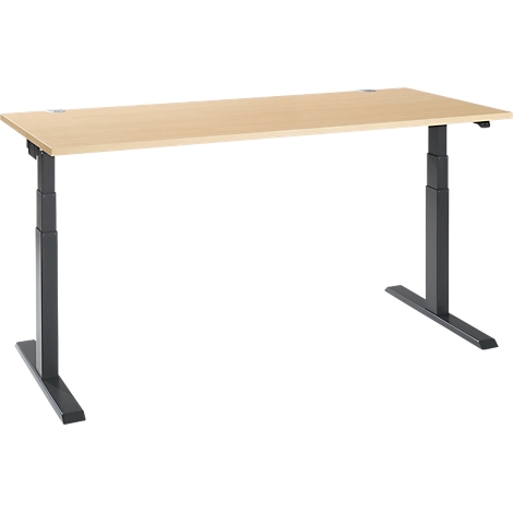 A height-adjustable desk with a light brown table top and black legs, against a white background.