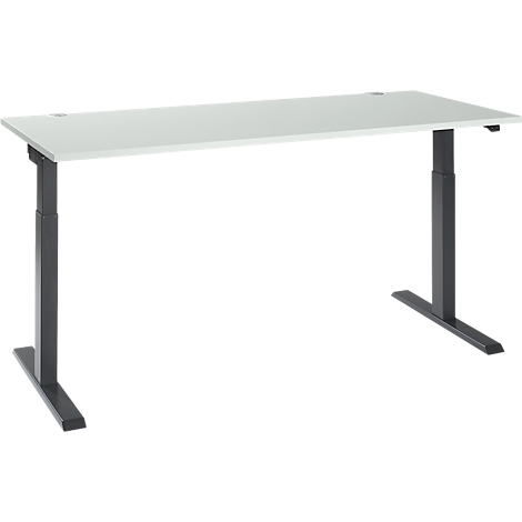 A white height-adjustable desk with gray metal legs on a white background.
